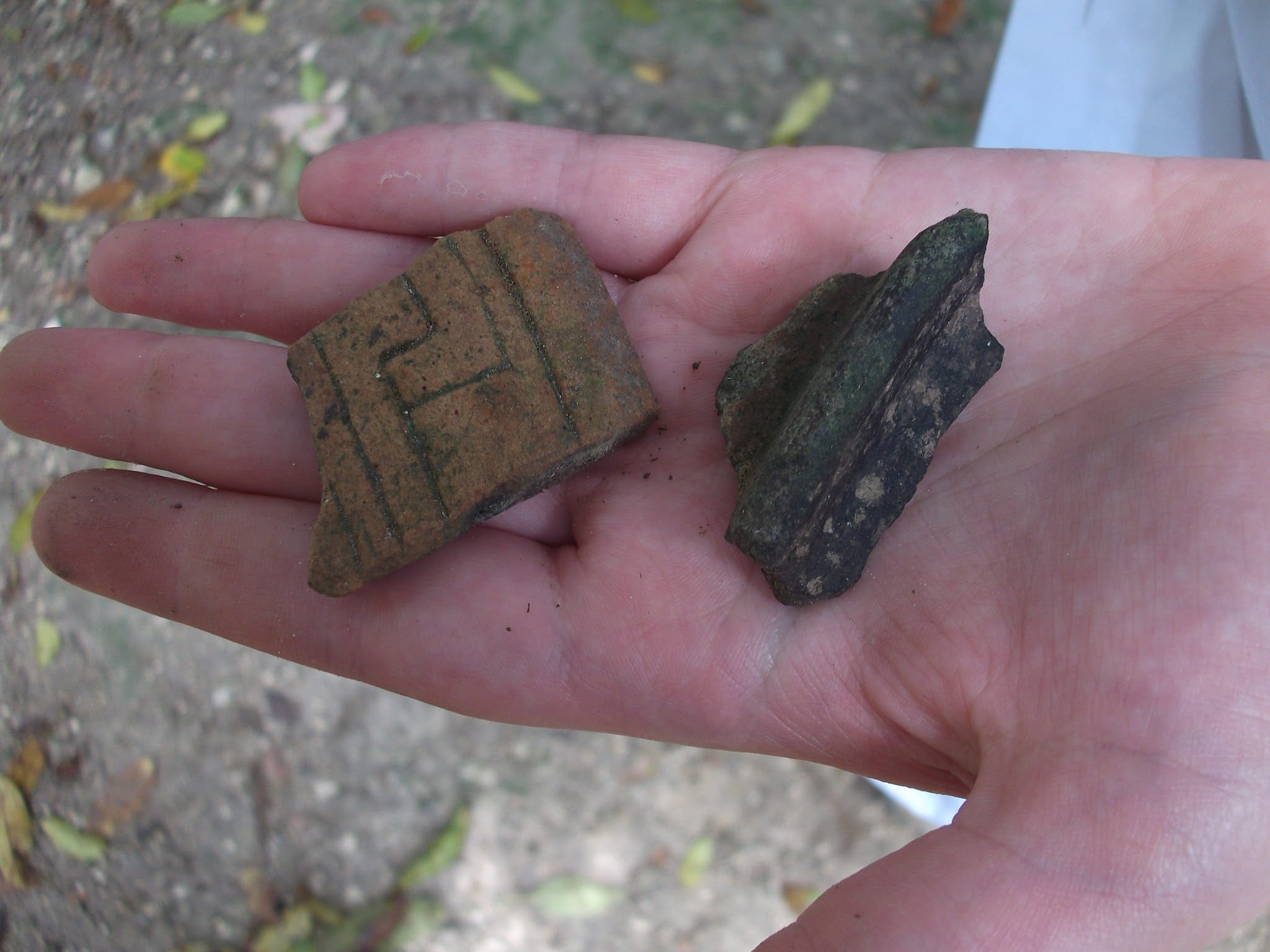 Two potsherds found during a walkabout at Lamanai, Belize. 